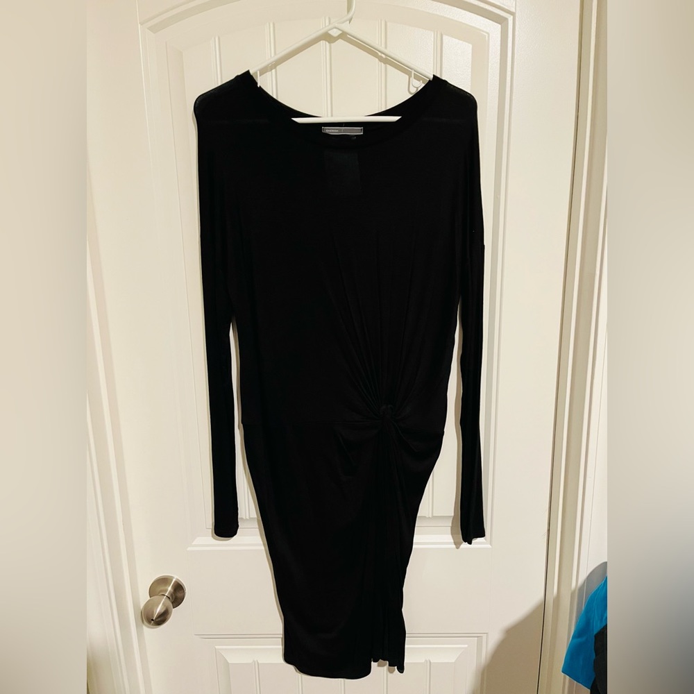 Black long sleeve dress with ruche detail at waist. Size L.